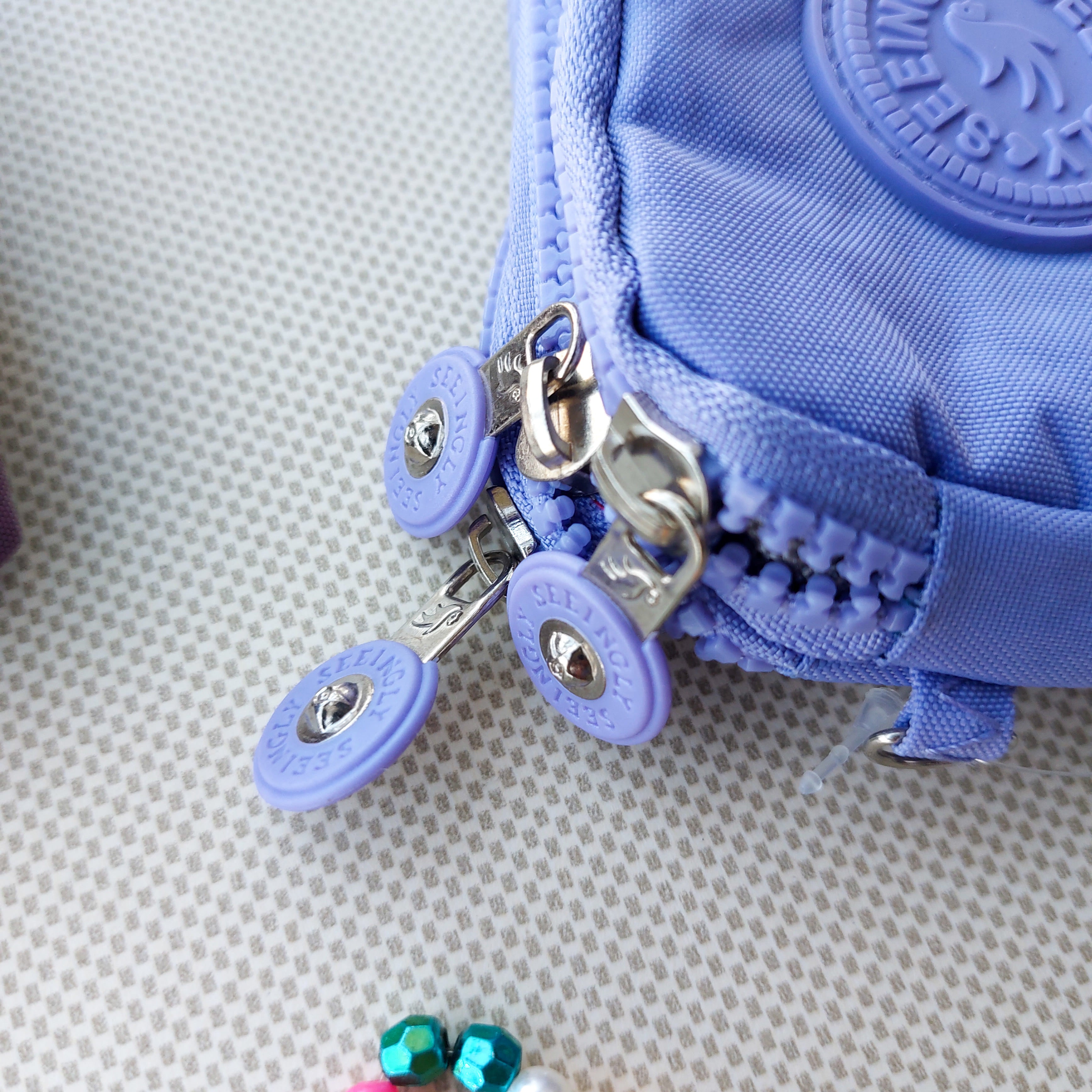 Seeingly Small Pouches Mauve and Purple - 3 Zip
