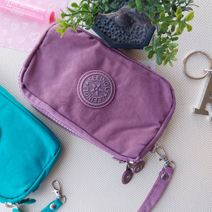 Seeingly Big Pouches Mauve and Teal 3 Zips