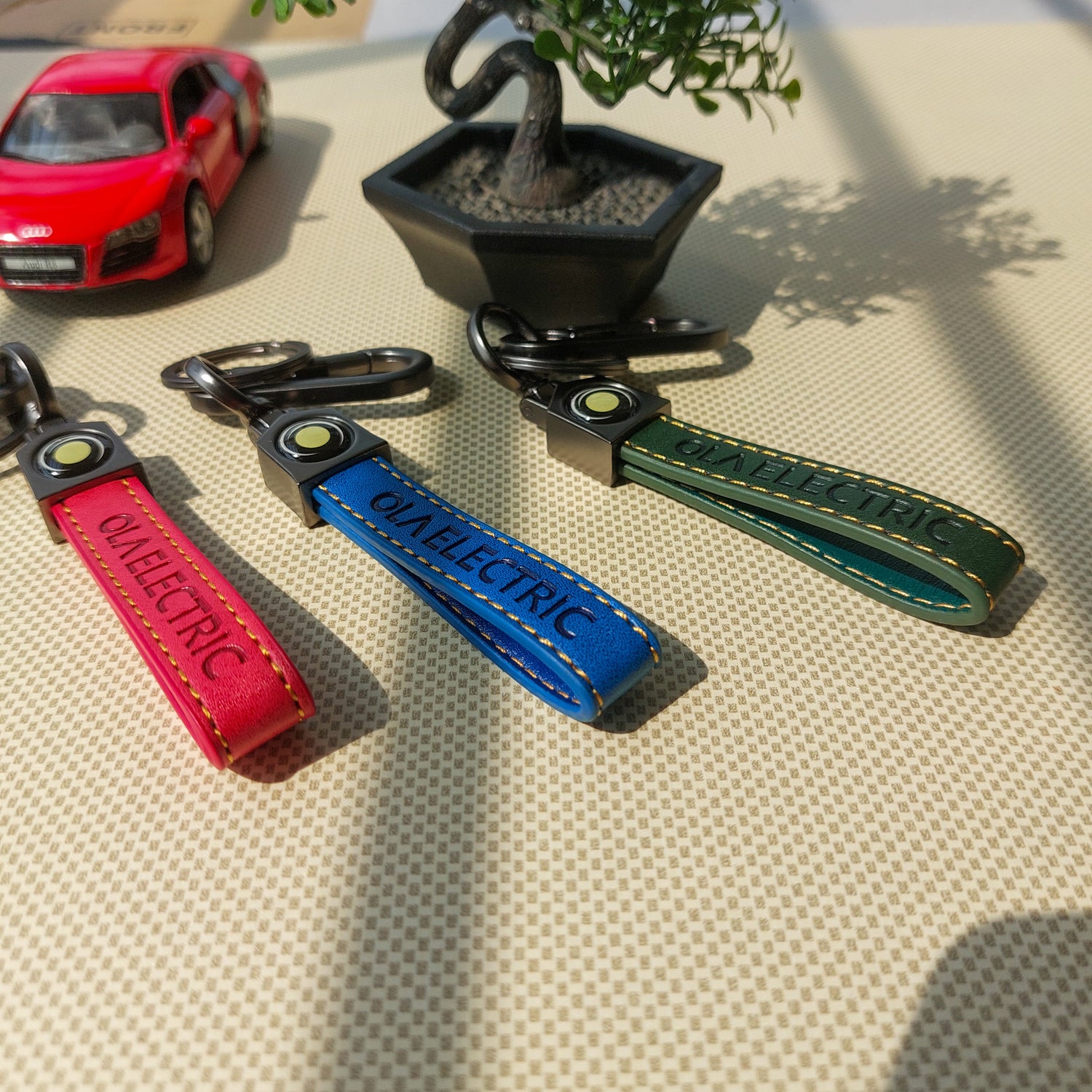 Ola Electric Logo Leather Keychains