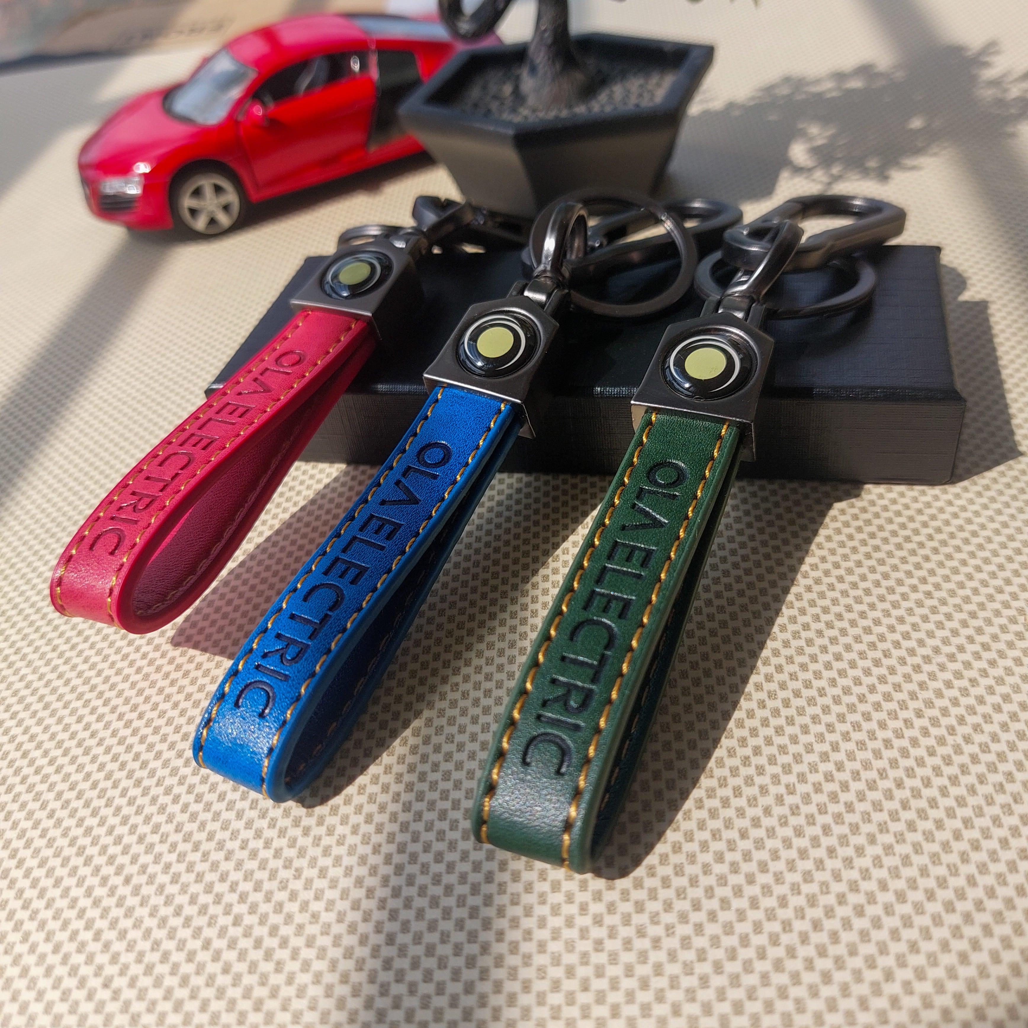 Ola Electric Logo Leather Keychains