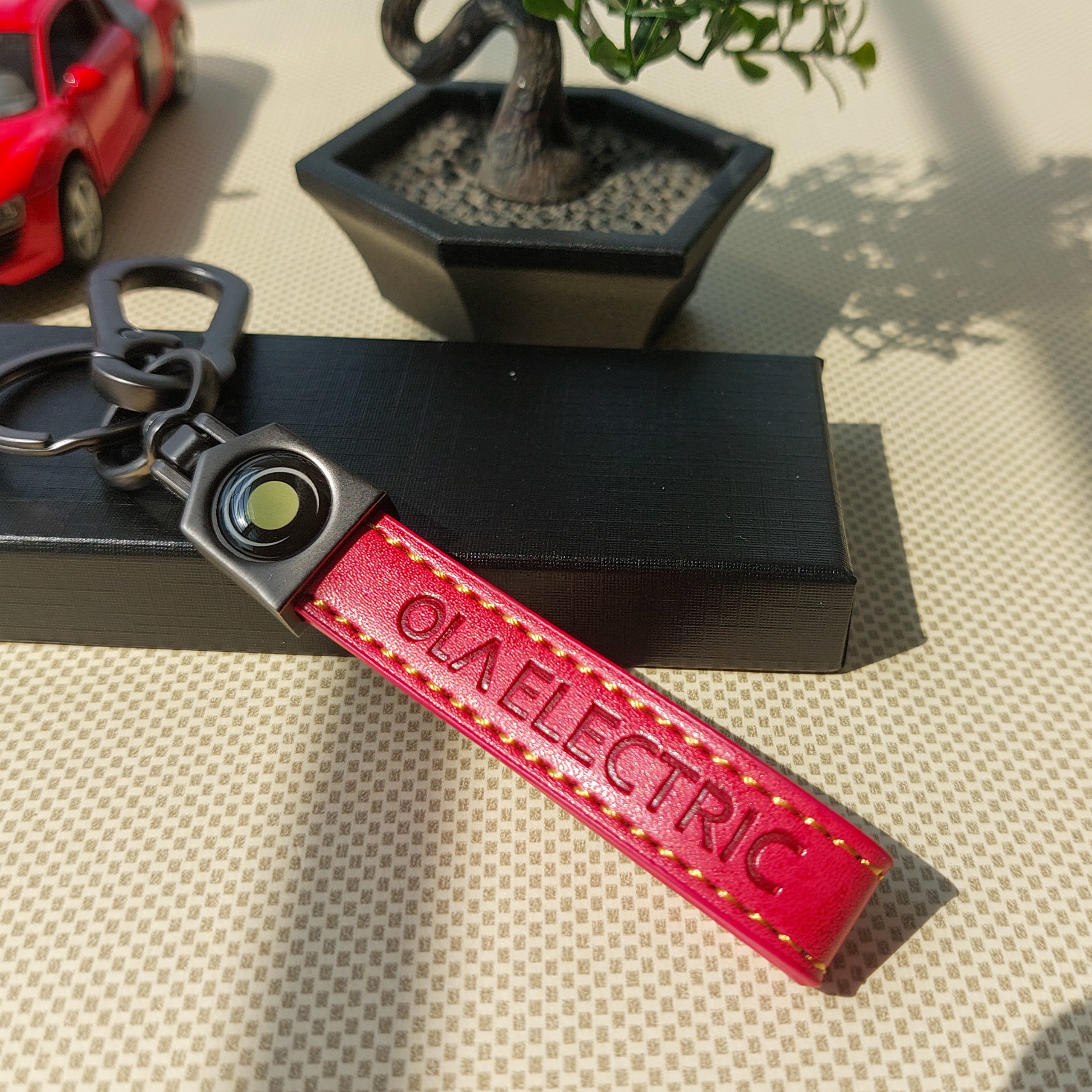 Ola Electric Logo Leather Keychains